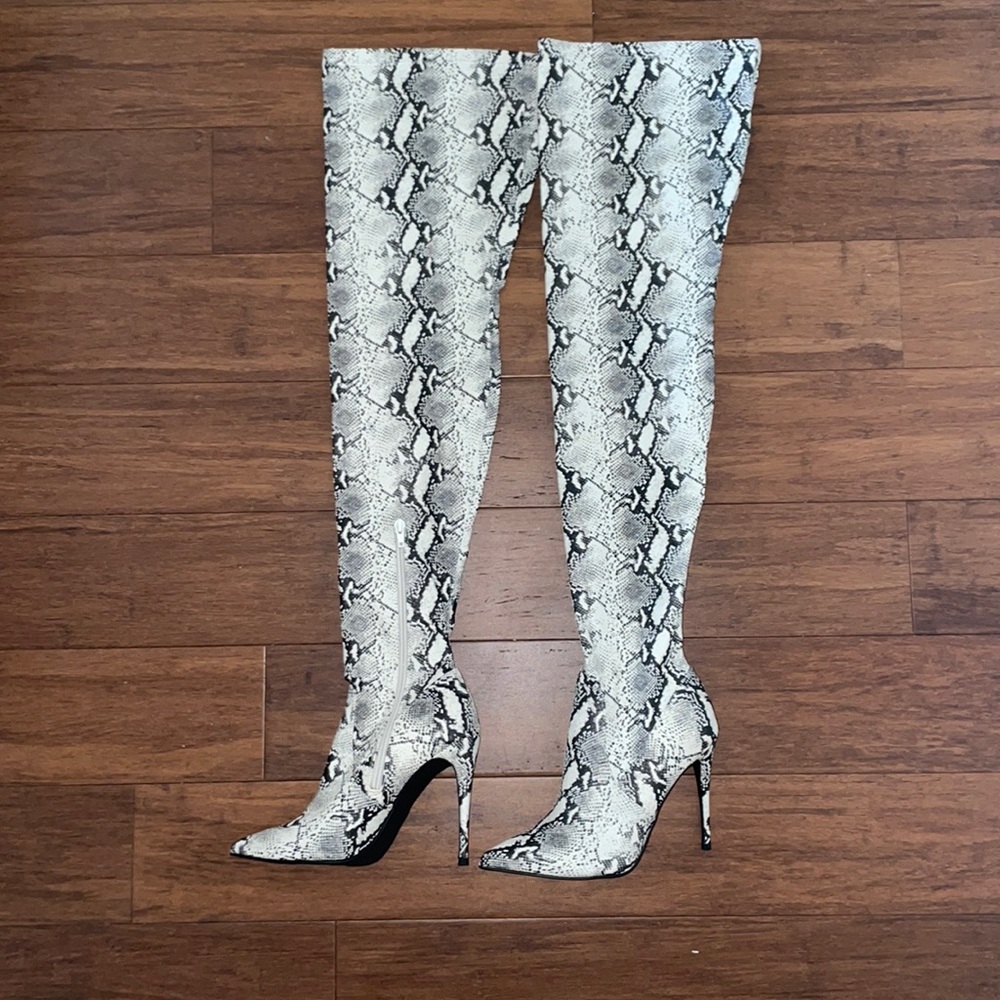 Brand new snakeskin thigh high boots